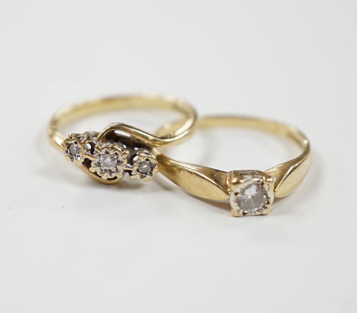 Two 9ct gold and diamond set rings including three stone and solitaire